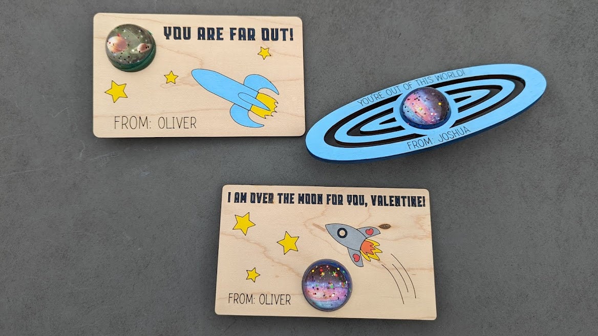 Space svg -  Classroom valentine svg with hole for bouncy ball - Includes rocketship and saturn - Laser cut file designed for Glowforge